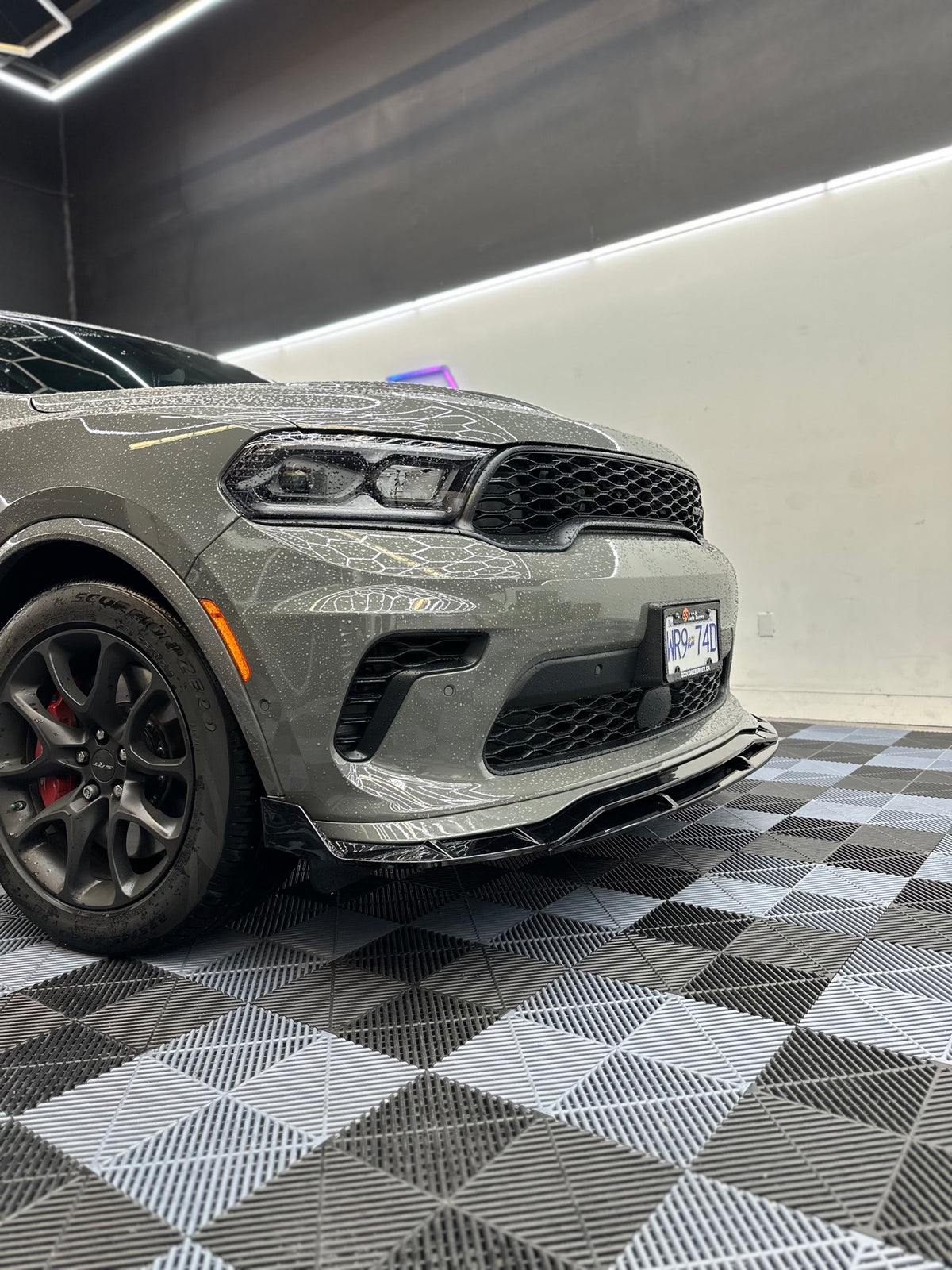 Dodge Durango gloss black front lip installed - close up