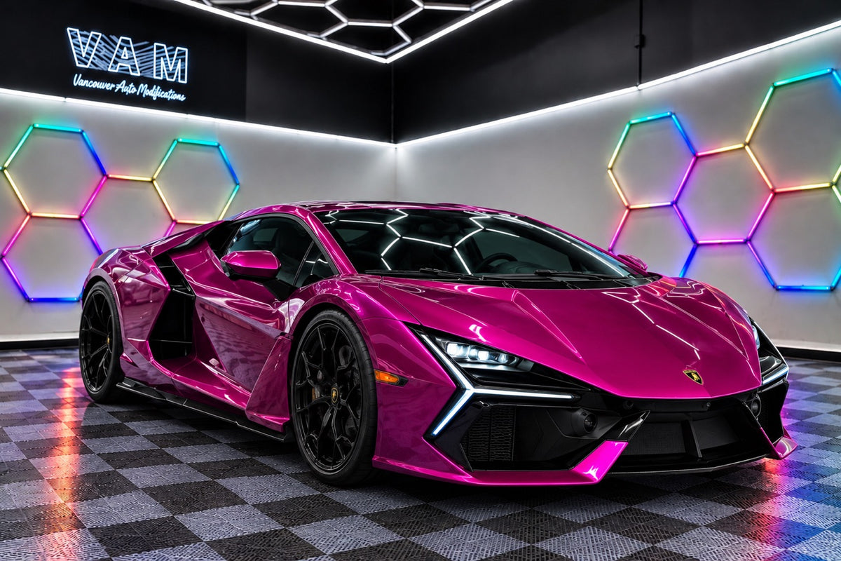 Pink Lamborghini in the PURE Auto Parts showroom
